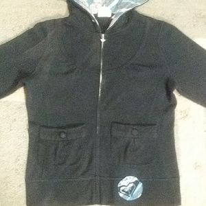 Black, white, and, turquoise Roxy vintage full zip hoodie. Front pockets.